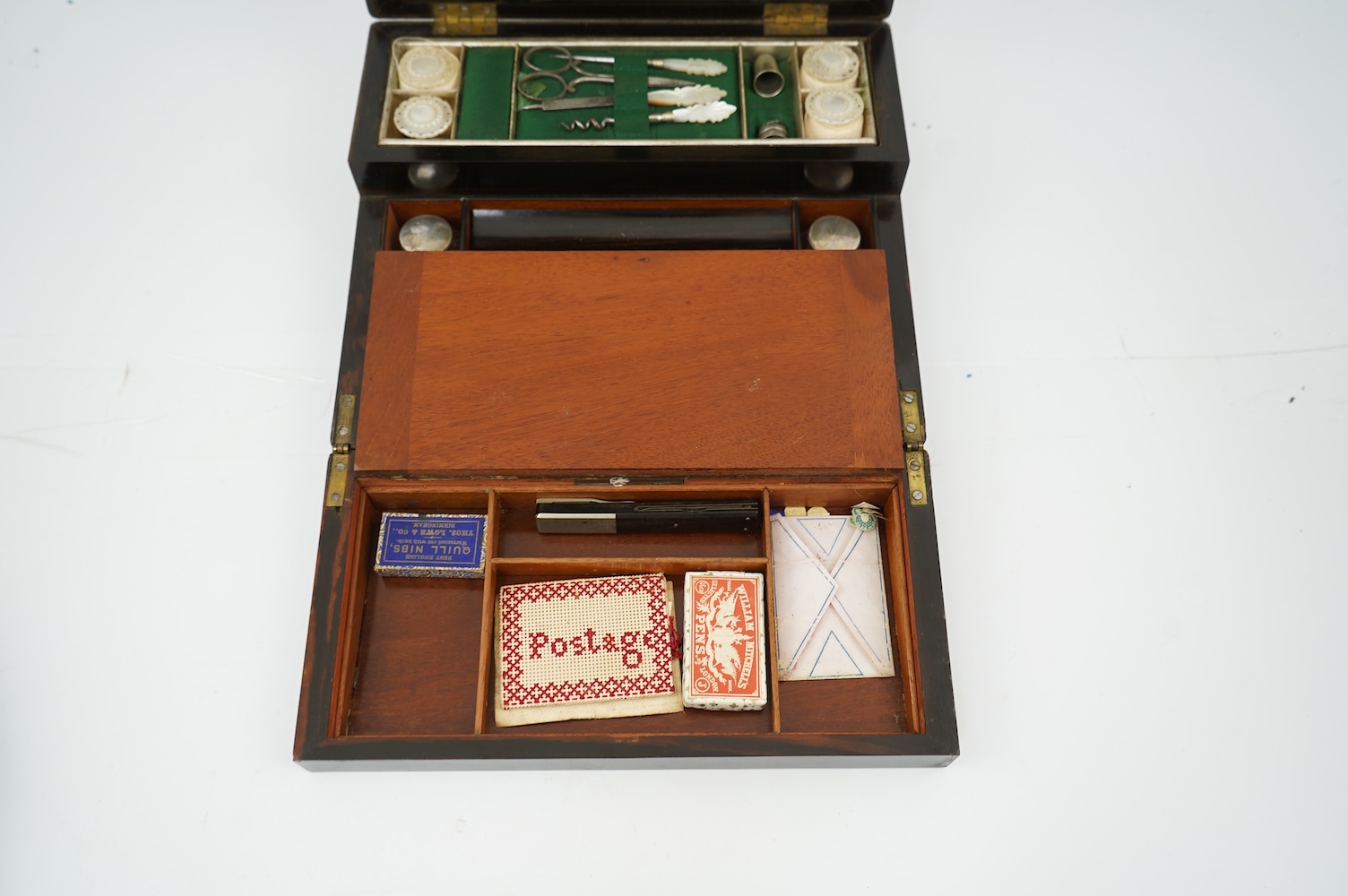 A mid 19th century rosewood writing and sewing box